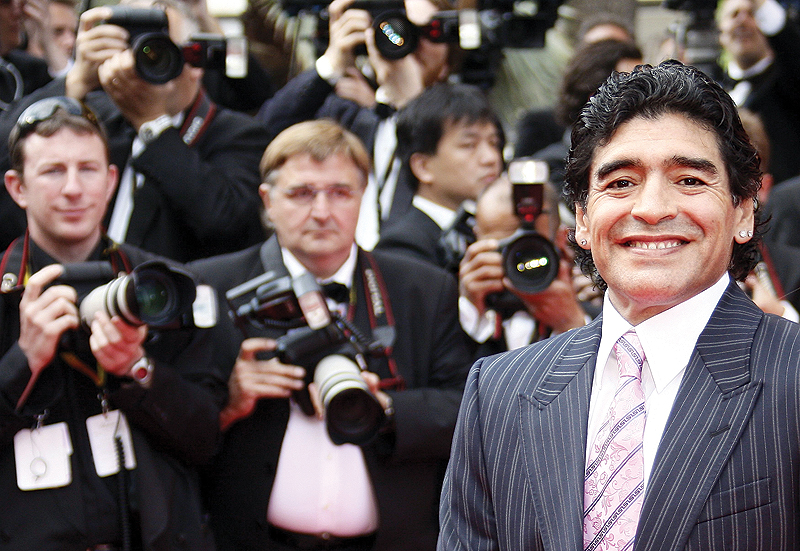 Former Argentinean football player Diego Maradona poses as he arrives to attend the screening of Steven Soderbergh’s film ‘Che’ at the 61st Cannes International Film Festival in Cannes, southern France. — AFP photos