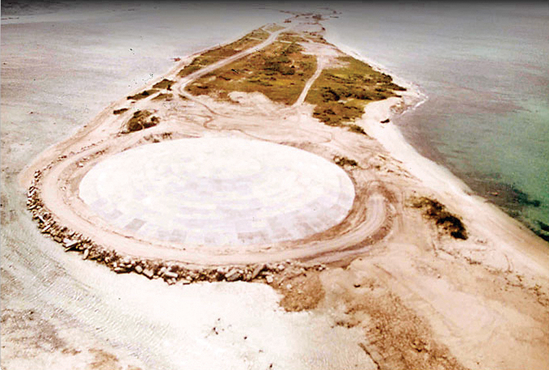 ENEWETAK, Marshall Islands: Picture taken by the US Defense Nuclear Agency in 1980 shows the huge dome built over top of a crater left by one of the 43 nuclear tests over Runit Island. — AFP