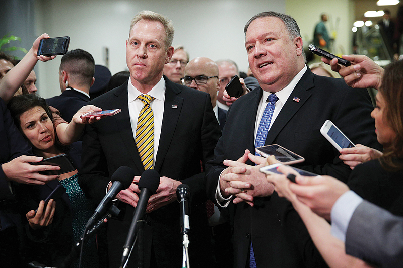 WASHINGTON: Acting US Defense Secretary Patrick Shanahan (left) speaks to members of the media as Secretary of State Mike Pompeo (right) listens after a closed briefing for Senate members on Capitol Hill in Washington, DC. - AFP n