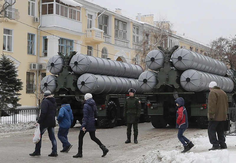 VOLGOGRAD: In this file photo people walk past Russian S-400 missile air defense systems before the military parade to commemorate the 75th anniversary of the battle of Stalingrad in World War Two, in the city of Volgograd, Russia.—Reuters