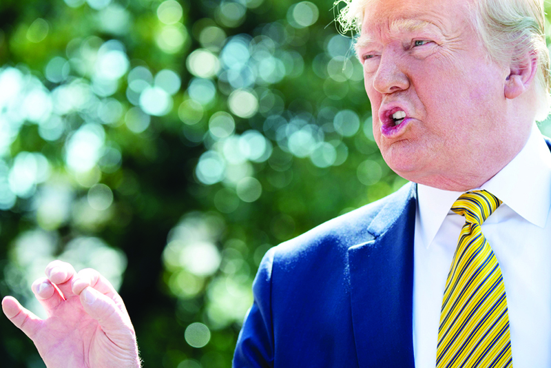 US President Donald Trump speaks to the media prior to departing on Marine One from the South Lawn of the White House in Washington, DC, June 22, 2019, as he travels to Camp David, Maryland. - Trump said Iran was ìvery wise ì not to shoot down the manned plane when it downed the drone and ìwe appreciate ì that move. (Photo by SAUL LOEB / AFP)