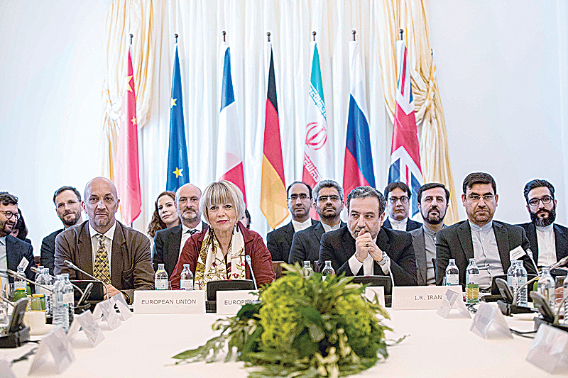 VIENNA: Abbas Araghchi (2nd right), political deputy at the Ministry of Foreign Affairs of Iran, and Helga Schmid (2nd left), Secretary General of the European Union’s External Action Service (EEAS), take part in a meeting of the Joint Commission of the Joint Comprehensive Plan of Action (JCPOA) attended by the E3+2 (China, France, Germany, Russia, United Kingdom) and Iran on June 28, 2019 at the Palais Coburg in Vienna. —AFP