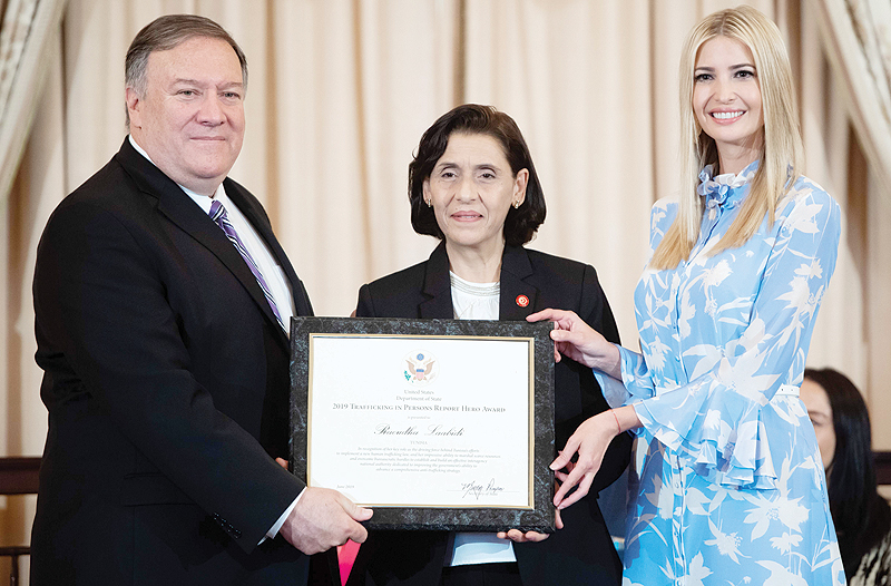 WASHINGTON: US Secretary of State Mike Pompeo and Senior White House Advisor Ivanka Trump present Raoudha Laabidi of Tunisia with the 2019 TIP Report Hero Award for her work to fight against human trafficking during a ceremony releasing the 2019 Trafficking in Persons Report at the State Department yesterday. – AFP n