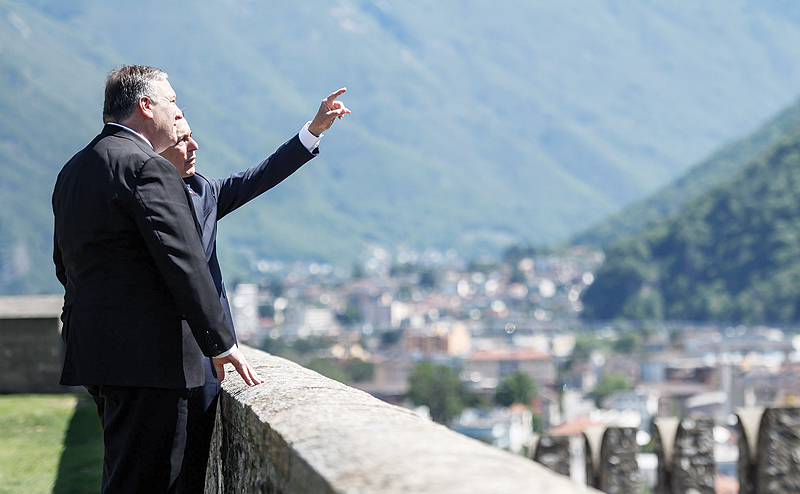 BELLINZONA: US Secretary of State Mike Pompeo (left) and Swiss counterpart Ignazio Cassis admire the view from the Castelgrande during a bilateral meeting yesterday. - AFP n