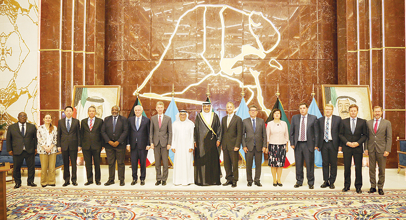 KUWAIT: Kuwait’s Deputy Premier and Foreign Minister Sheikh Sabah Al-Khaled Al-Hamad Al-Sabah poses for a group photo with visiting representatives of UN Security Council members. — KUNA
