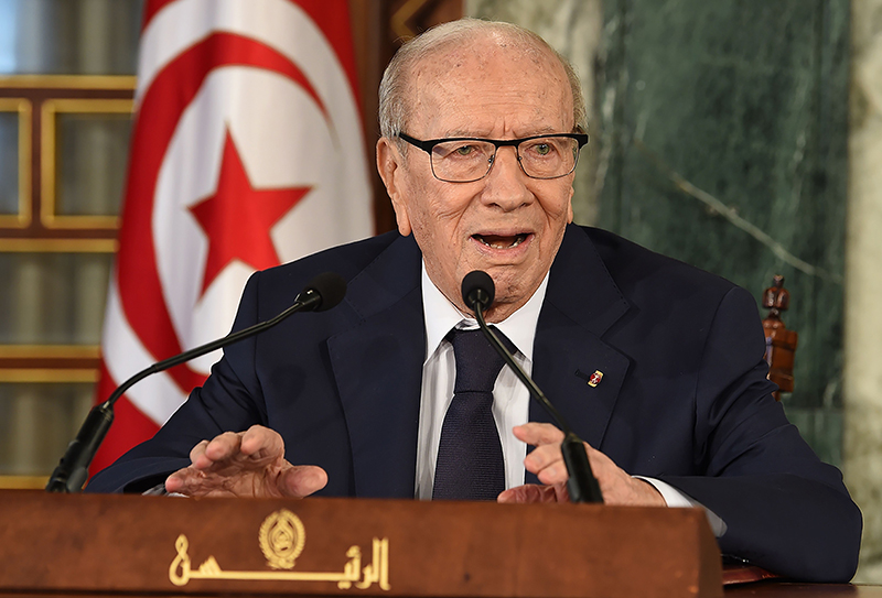 (FILES) A file photo taken on November 8, 2018 shows Tunisian President Beji Caid Essebsi giving a press conference in Carthage Palace near Tunis concerning the cabinet reshuffle. - Essebsi has been admitted to intensive care on July 25, 2019, according to his son. (Photo by FETHI BELAID / AFP)