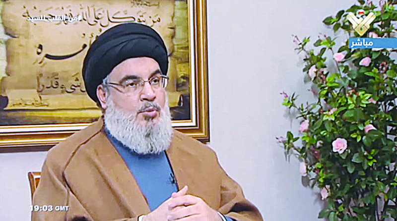 An image grab taken from Hezbollah's al-Manar TV on July 12, 2019, shows Hasan Nasrallah, the head of Lebanon's militant Shiite movement Hezbollah, giving an interview in Lebanon. - The head of Lebanon's Hezbollah movement Hassan Nasrallah said on July 12 he had decreased the number of troops supporting the Damascus regime in neighbouring war-torn Syria. With key military backing from Russia, the Damascus government has taken back large swathes of territory from rebels and jihadists since 2015, and now controls around 60 percent of the country. (Photo by - / various sources / AFP)