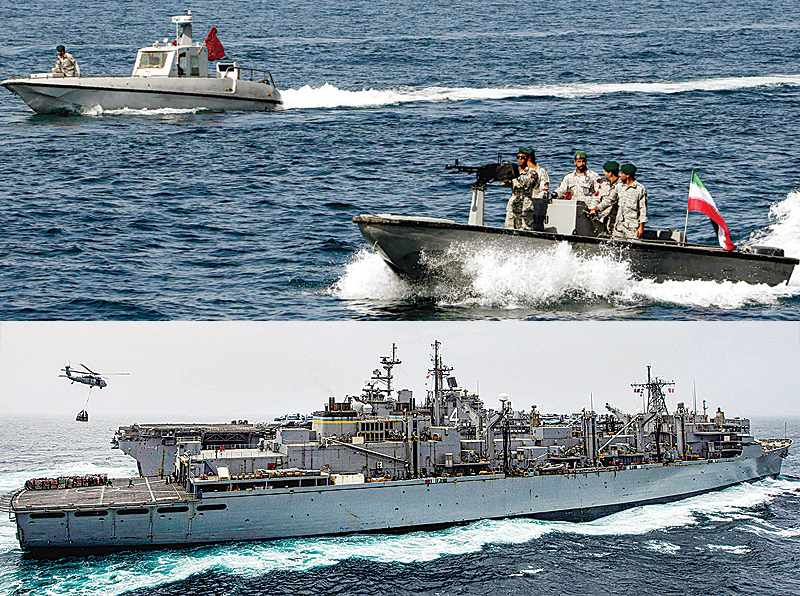 AT SEA: This combination of file pictures shows Iranian soldiers taking part in the ‘National Persian Gulf day’ in the Strait of Hormuz (up) and the amphibious assault ship USS Boxer (LHD 4) receiving a vertical replenishment-at-sea in the Arabian Sea. —AFP