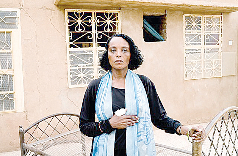 KHARTOUM: Khadija Saleh, 41, political activist and blogger, poses for a photograph in Khartoum, Sudan. —Reuters