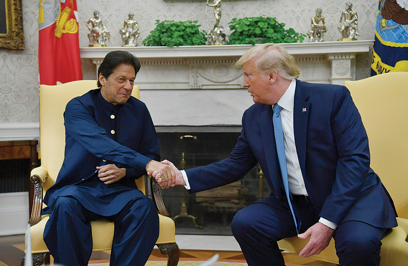 WASHINGTON: US President Donald Trump meets Pakistani Prime Minister Imran Khan in the Oval Office of the White House yesterday. – AFP 