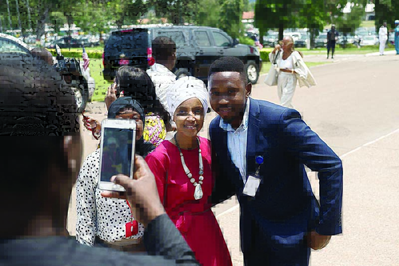 (FILES) In this file photo taken on July 31, 2019 US Representative Ilhan Omar (L) poses for pcitures as she arrives at the Ghana's Parliament in Accra, during a three-day visit to the country to mark the 400 years anniversary since the first slave shipment left the Ghana's coast for United States. - Israel may bar a visit by two US congresswomen who have expressed support of a boycott of the Jewish state despite having signalled they would be allowed in, a government official said on August 15. Ilhan Omar and Rashida Tlaib, who is of Palestinian origin, are expected at the weekend for a visit to Israel and the Palestinian territories. Prime Minister Benjamin Netanyahu held consultations on the visit on Wednesday and a final decision is being weighed, the government official said on condition of anonymity. (Photo by Natalija GORMALOVA / AFP)
