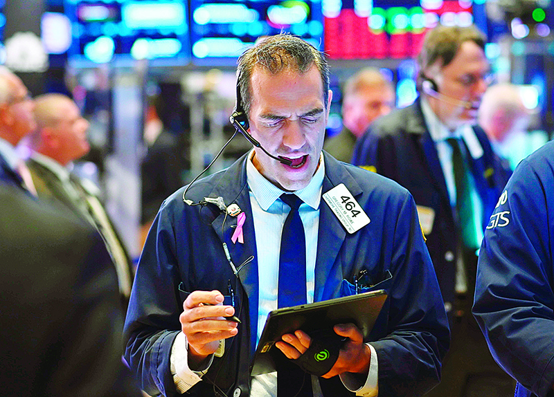 Traders work after the opening bell at the New York Stock Exchange (NYSE) on August 15, 2019 at Wall Street in New York City. - Wall Street stocks opened higher Thursday following mixed US economic data, bouncing modestly after the Dow suffered its worst session of the year. About five minutes into trading, the Dow Jones Industrial Average was at 25,531.36, up 0.2 percent. The broad-based S&amp;P 500 also added 0.2 percent at 2,846.22, along with the tech-rich Nasdaq Composite Index, which stood at 2,846.22. (Photo by Johannes EISELE / AFP)