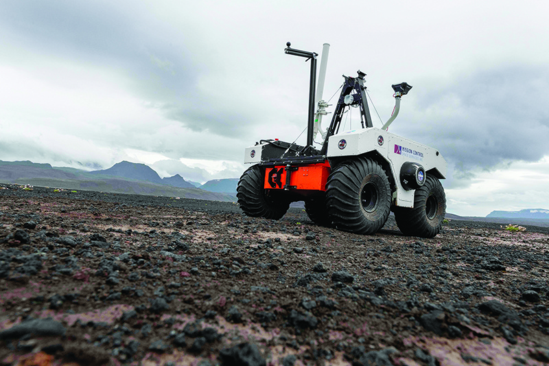 In this picture taken on July 19, 2019 shows the NASA's new robotic space explorer at their base at the Lambahraun lava field in Iceland where they are getting it ready for the next mission to Mars. - To prepare for the next mission to Mars in 2020, NASA has taken to the lava fields of Iceland to get its new robotic space explorer ready for the job. With its black basalt sand, wind-swept dunes and craggy peaks, the Lambahraun lava field at the foot of Iceland's second biggest glacier, Langjokull, was chosen as a stand-in for the Red Planet's surface. (Photo by Halldor KOLBEINS / AFP)