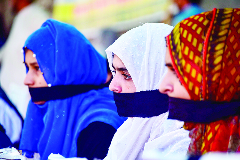 Kashmiri refugees in Pakistan-administered Kashmir take part in an anti-Indian protest rally in Muzaffarabad on August 18, 2019. - Pakistan's Prime Minister Imran Khan on August 18 welcomed the UN Security Council's decision to discuss tensions in the disputed region of Kashmir, a day after India slammed the rare meeting. (Photo by SAJJAD QAYYUM / AFP)