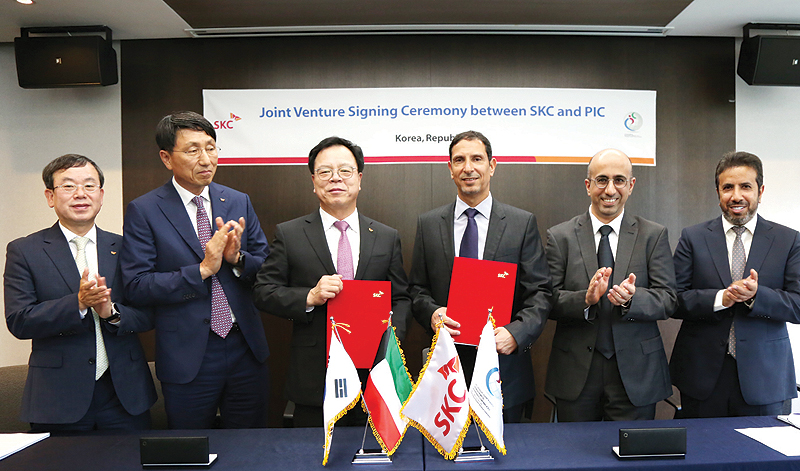 KUWAIT: Kuwait’s Petrochemical Industries Company and South Korea’s SKC react after signing the agreement. — KUNA