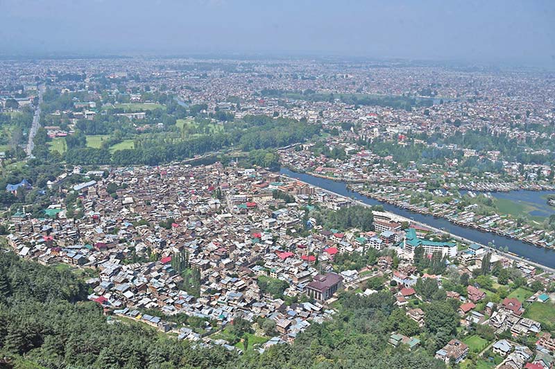 A general view of the city from the top of a hill in Srinagar on August 25, 2019. (Photo by Tauseef MUSTAFA / AFP)