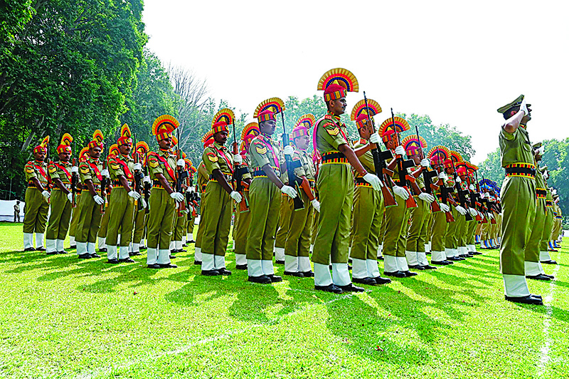 Indian Border Security Force (BSF) personnel stand in a formation during a ceremony to celebrate India's 73rd Independence Day, which marks the end of British colonial rule, in Srinagar on August 15, 2019. (Photo by Tauseef MUSTAFA / AFP)