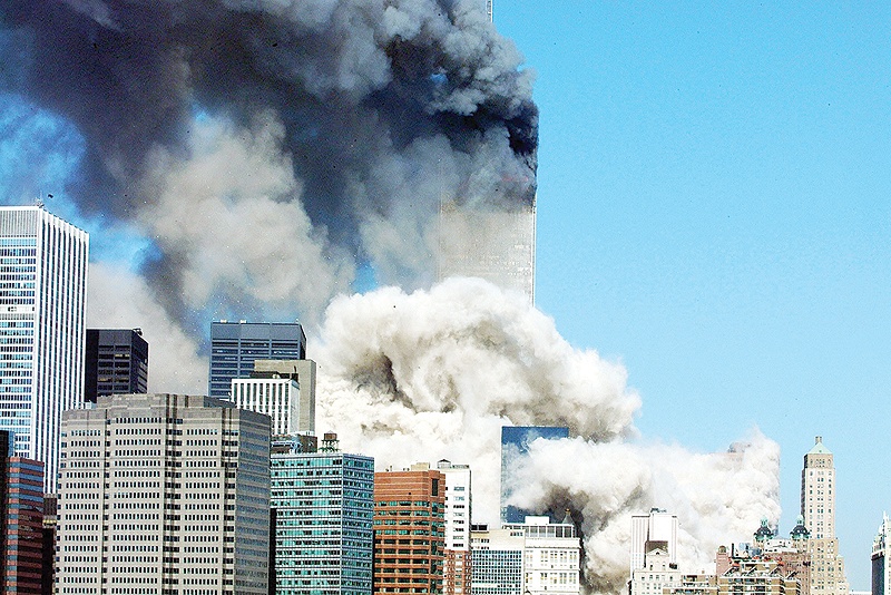 NEW YORK: In this file photo smoke billowing after the first of the two towers of the World Trade Center collapses in New York City.-AFP