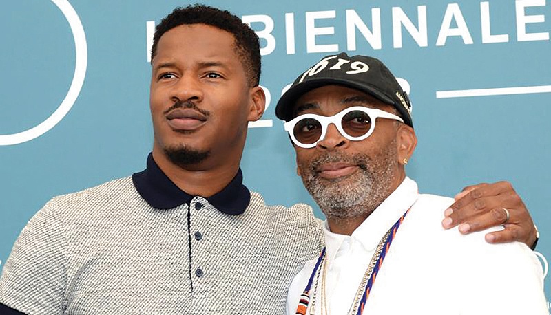 Nate Parker and Spike Lee attend a photo call during Venice Film Festival. — AFP