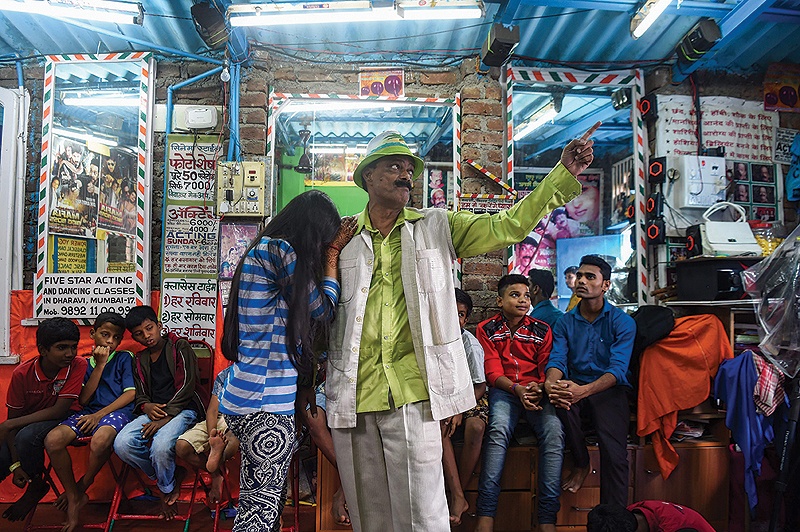 Acting teacher Baburao Ladsaheb performs for his students during a class at the ‘Five Star Acting Dancing Fighting Classes’ in Mumbai’s Dharavi, one of Asia’s biggest slums.— AFP photos
