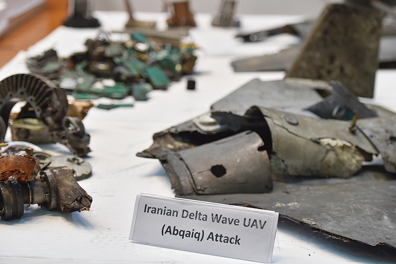 RIYADH: A picture taken yesterday shows displayed fragments of what the Saudi defense ministry spokesman said were Iranian cruise missiles and drones recovered from the attack site that targeted Saudi Aramco's facilities, during a press conference yesterday. – AFP  