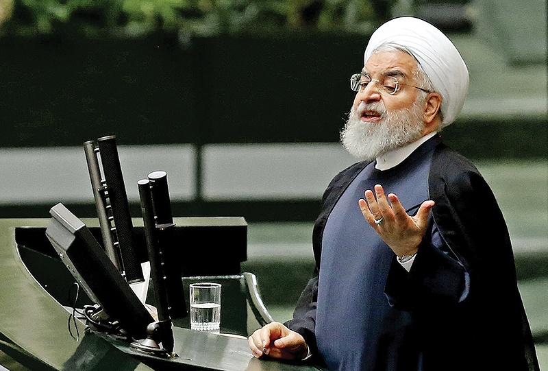  TEHRAN: Iran's President Hassan Rouhani addresses parliament in the capital yesterday. In an address to parliament, Rouhani ruled out holding any bilateral talks with US, saying the Islamic republic is opposed to such negotiations in principle. - AFP 