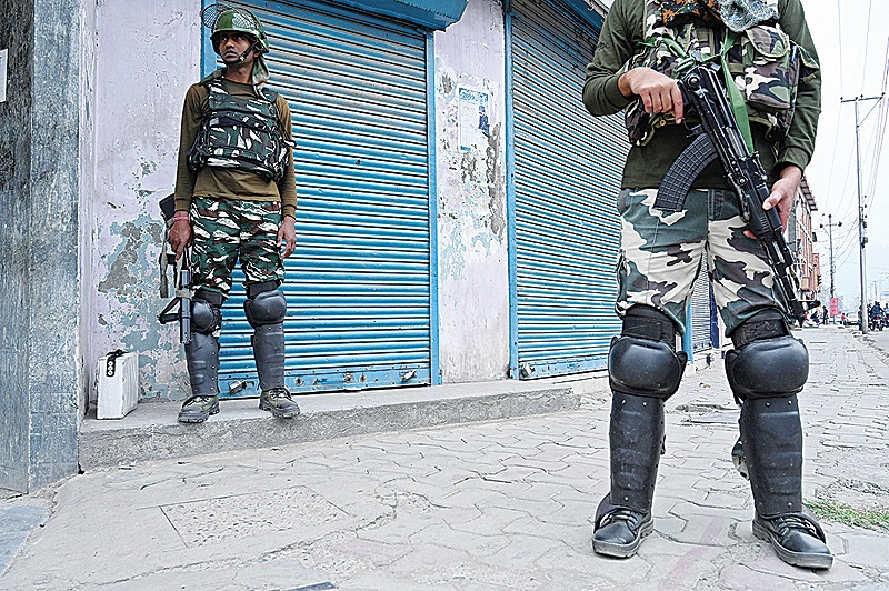 SRINAGAR: Indian paramilitary troopers stand guard. —AFP