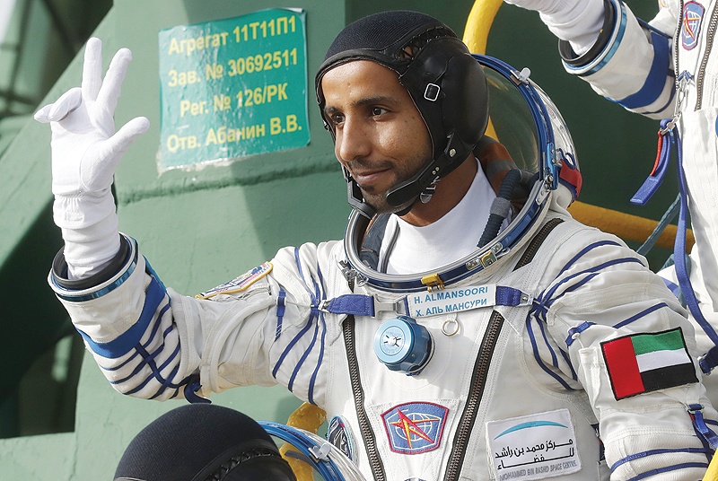 International Space Station (ISS) crewmember, UAE astronaut Hazzaa Al-Mansoori, waves as he boards the Soyuz MS-15 spacecraft at the Russian-leased Baikonur cosmodrome in Kazakhstan yesterday.