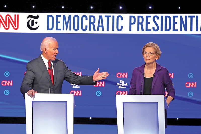 WESTERVILLE, OHIO - OCTOBER 15: Former Vice President Joe Biden challenges Sen. Elizabeth Warren (D-MA) during the Democratic Presidential Debate at Otterbein University on October 15, 2019 in Westerville, Ohio. A record 12 presidential hopefuls are participating in the debate hosted by CNN and The New York Times.   Win McNamee/Getty Images/AFP