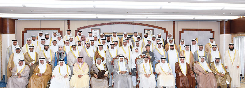 KUWAIT: His Highness the Amir Sheikh Sabah Al-Ahmad Al-Jaber Al-Sabah, His Highness the Crown Prince Sheikh Nawaf Al-Ahmad Al-Jaber Al-Sabah, Cabinet ministers and National Assembly members pose for a group picture. — Photos by Amiri Diwan and Yasser Al-Zayyat