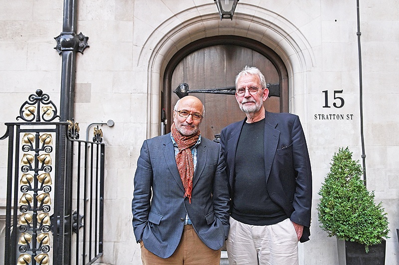 Iranian director Taghi Amirani, left, and US editor Walter Murch of the film ‘Coup 53’, pose in London. — AFP