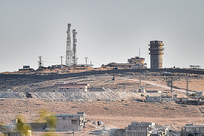 This picture taken on October 12, 2019 from Turkey near the town of Suruc shows a US observation post near the Syrian town of Kobani Kobane where the Pentagon said an explosion occurred “within a few hundred meters.” —AFP