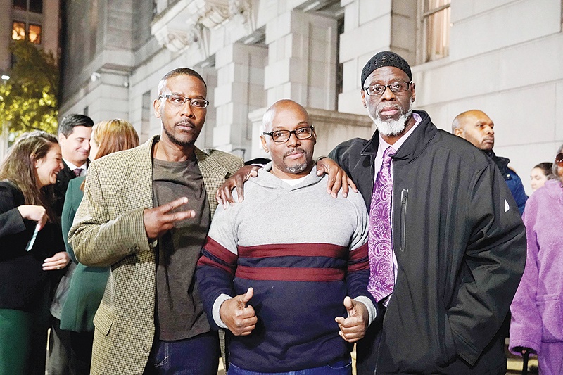 BALTIMORE: (From left) Alfred Chesnut, Andrew Stewart and Ransom Watkins pose for a photo after their release on Monday. — AFP