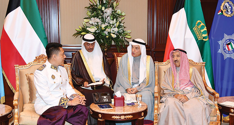 KUWAIT: His Highness the Amir Sheikh Sabah Al-Ahmad Al-Jaber Al-Sabah meets with the new Ambassador of Cambodia to Kuwait. - Amiri Diwan photos