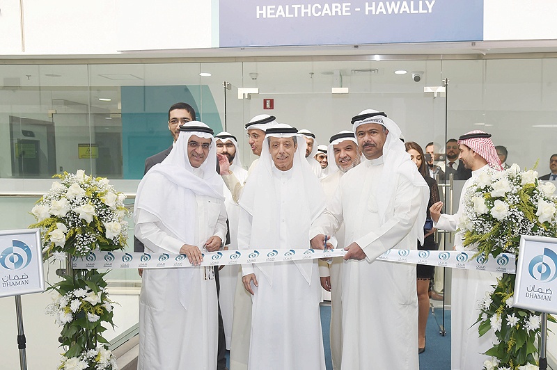 KUWAIT: Dhaman officials open the company's first primary healthcare center for expats in Hawally yesterday. - Photo by Fouad Al-Shaikh