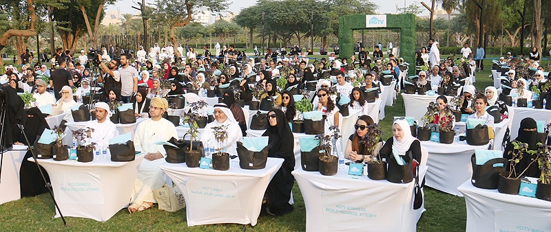 KUWAIT: Participants set a new world record for the world's 'largest gardening lesson' at Shaheed Park yesterday. - Photo by Yasser Al-Zayyat