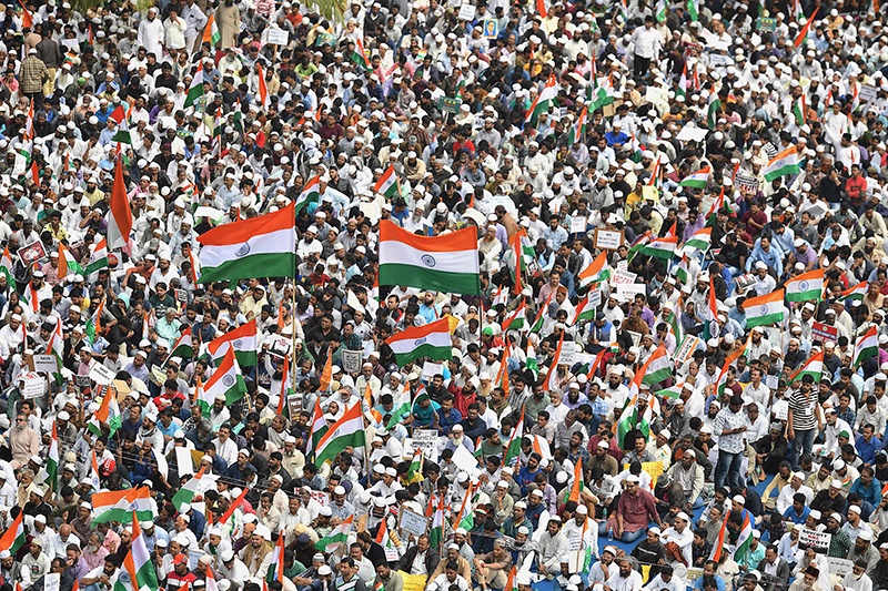 TOPSHOT - Demonstrators gather at the Quddus Saheb Eidgah grounds to take part in a rally against India's new citizenship law in Bangalore on December 23, 2019. - The wave of protests across the country marks the biggest challenge to Modi's government since sweeping to power in the world's largest democracy in 2014. (Photo by Manjunath Kiran / AFP)