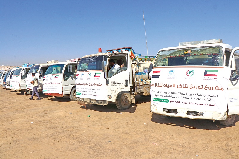 Kuwait-based charity doled out water tanks to displaced people in Yemen.