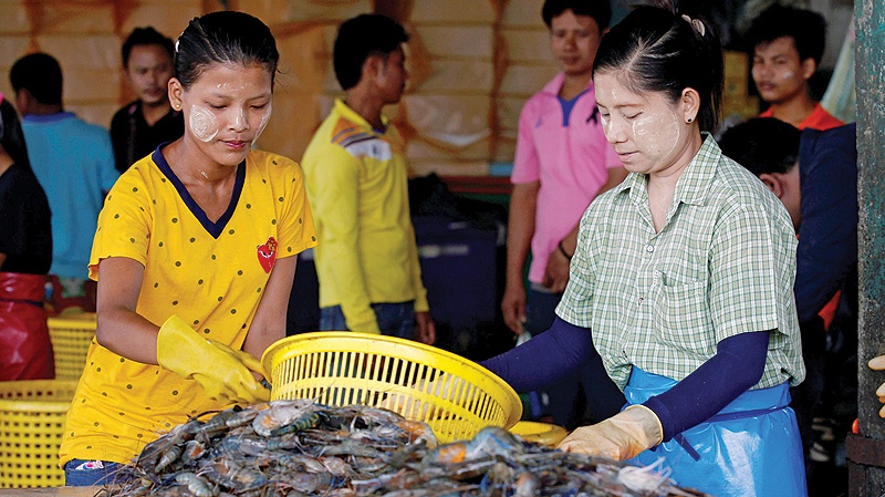 Myanmar workers in Thailand.— Reuters