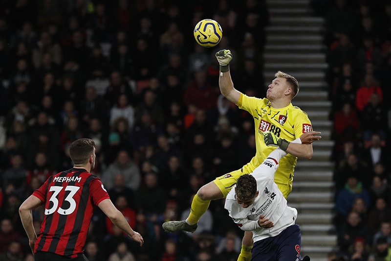 BOURNEMOUTH:  Bournemouth's English goalkeeper Aaron Ramsdale (top) punches the ball away during the English Premier League football match between Bournemouth and Liverpool at the Vitality Stadium in Bournemouth, southern England yesterday. - AFP