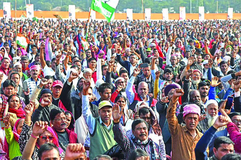 Congress Party activists and supporters shout slogans during a rally against India's new citizenship law, in Guwahati on December 28, 2019. (Photo by Biju BORO / AFP) / ìThe erroneous mention[s] appearing in the metadata of this photo by Biju BORO has been modified in AFP systems in the following manner: [Biju BORO] instead of [Jewel Samad]. Please immediately remove the erroneous mention[s] from all your online services and delete it (them) from your servers. If you have been authorized by AFP to distribute it (them) to third parties, please ensure that the same actions are carried out by them. Failure to promptly comply with these instructions will entail liability on your part for any continued or post notification usage. Therefore we thank you very much for all your attention and prompt action. We are sorry for the inconvenience this notification may cause and remain at your disposal for any further information you may require.î