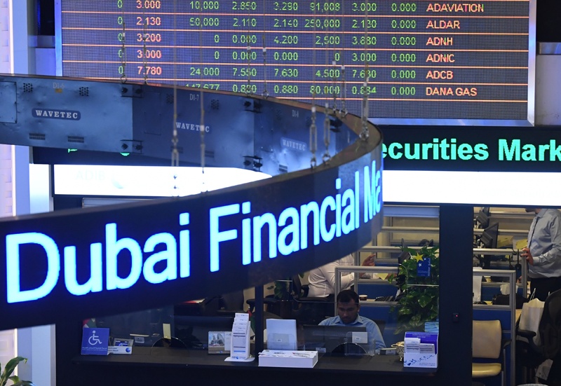 A photo taken on January 6, 2020 shows the Dubai Financial Market in the Gulf emirate as Gulf bourses were hit by a panicky sell-off amid Iranian vows of retaliation over the US killing of a top general. - All seven bourses in the Gulf Cooperation Council (GCC) states closed in the red, on the first trading day since the death of powerful military commander Qasem Soleimani. (Photo by Karim SAHIB / AFP)