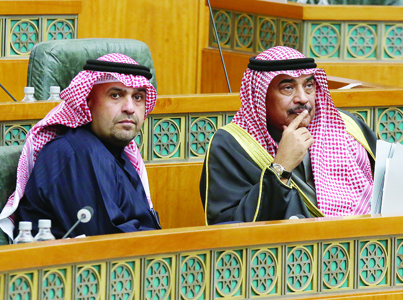 Kuwaiti Prime Minister Sheikh Sabah al-Khaled al-Hamad al-Sabah (R) and Deputy Prime Minister and Minister of State for Cabinet Affairs Anas al-Saleh attend a parliament session at Kuwait's national assembly in Kuwait City on January 9, 2020. - Kuwait denied reports that the United States had decided to withdraw its troops from the Gulf state, saying the Twitter account of its official news agency had been hacked. (Photo by YASSER AL-ZAYYAT / AFP)