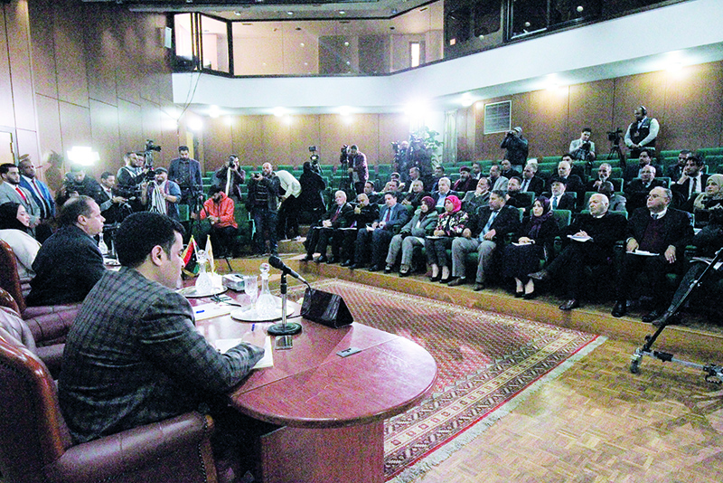 The Libyan House of Representatives (HOR) holds an emergency session in the eastern Libyan city of Benghazi on January 4, 2020 to discuss Turkey's prospective military intervention in support of the UN-recognised Tripoli-based government . - Libya's elected parliament in the east is allied with military strongman Khalifa Haftar, who is at war with the Tripoli-based GNA, headed by Fayez al-Sarraj. (Photo by Abdullah DOMA / AFP)