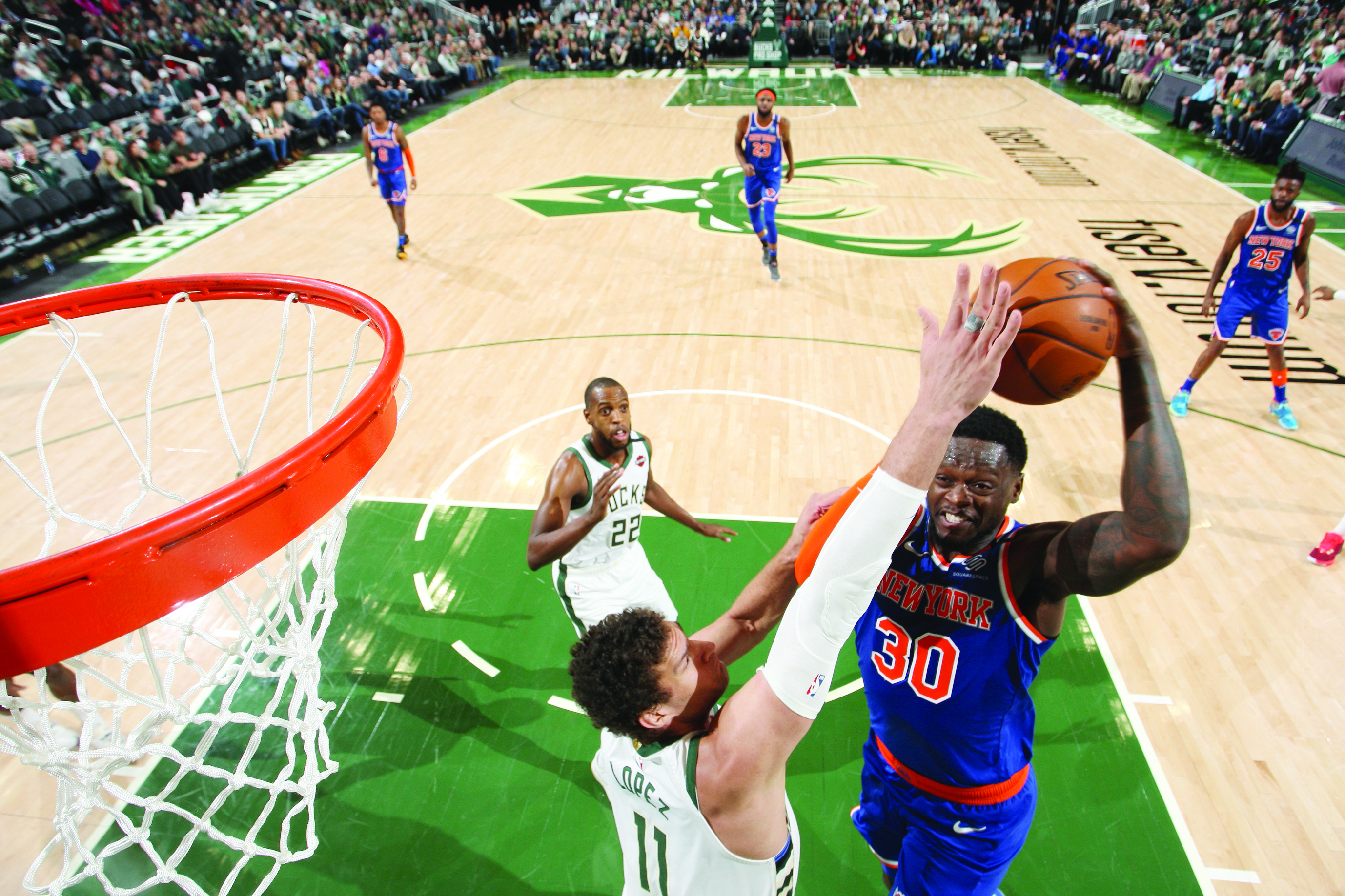 MILWAUKEE, WI - JANUARY 14: Julius Randle #30 of the New York Knicks shoots the ball against the Milwaukee Bucks on January 14, 2020 at the Fiserv Forum Center in Milwaukee, Wisconsin. NOTE TO USER: User expressly acknowledges and agrees that, by downloading and or using this Photograph, user is consenting to the terms and conditions of the Getty Images License Agreement. Mandatory Copyright Notice: Copyright 2020 NBAE   Gary Dineen/NBAE via Getty Images/AFP.