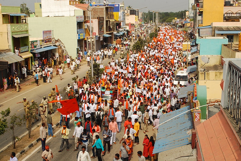 Hindu activists take part in a demonstration against a large planned statue of Jesus Christ in Ramanagar in India's southern Karnataka state on January 13, 2020. - Hundreds of Hindu activists affiliated to India's ruling party rallied on January 13 to protest a planned Jesus statue that will rival Rio de Janeiro's Christ The Redeemer colossus for size. (Photo by STR / AFP)