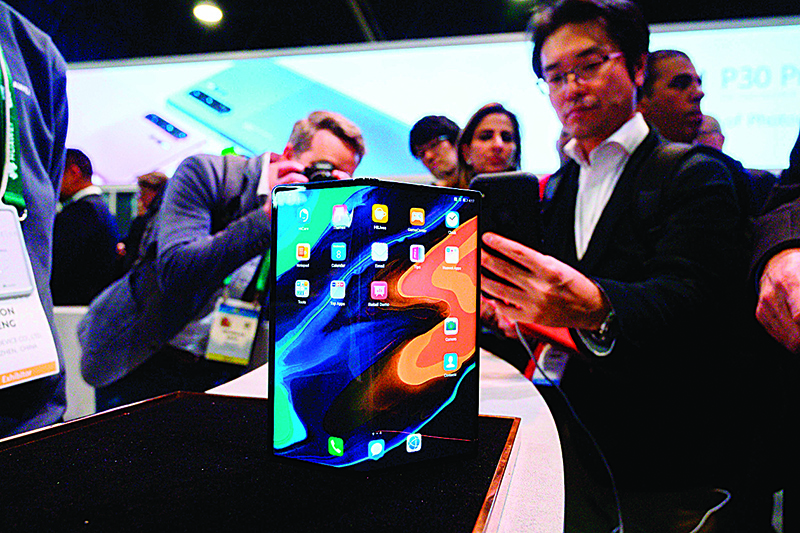 The Huawei Mate X foldable smartphone is displayed January 8, 2020 at the 2020 Consumer Electronics Show (CES) in Las Vegas, Nevada. (Photo by Robyn Beck / AFP)