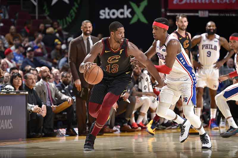 CLEVELAND, OH - FEBRUARY 26: Tristan Thompson #13 of the Cleveland Cavaliers handles the ball against the Philadelphia 76ers on February 26, 2020 at Rocket Mortgage FieldHouse in Cleveland, Ohio. NOTE TO USER: User expressly acknowledges and agrees that, by downloading and/or using this Photograph, user is consenting to the terms and conditions of the Getty Images License Agreement. Mandatory Copyright Notice: Copyright 2020 NBAE   David Liam Kyle/NBAE via Getty Images/AFP
