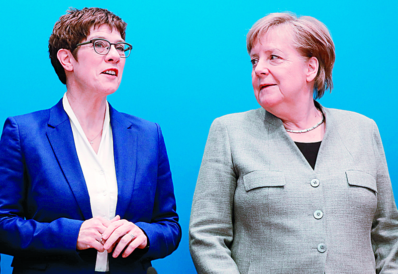 Annegret Kramp-Karrenbauer (L), leader of Germany's conservative CDU party, and German Chancellor Angela Merkel pose during a meeting with their party's leadership on February 10, 2020 in Berlin. (Photo by Odd ANDERSEN / AFP)