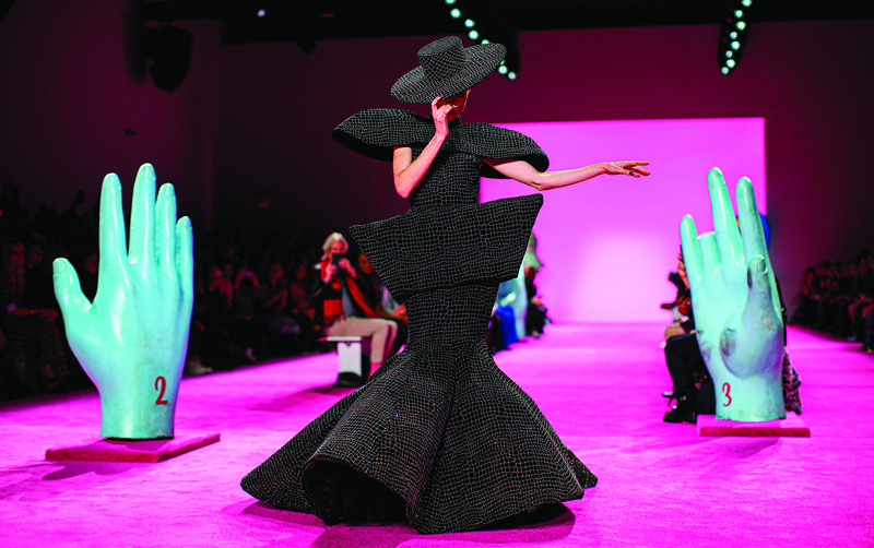 TOPSHOT - Canadian model Coco Rocha presents a creation for Christian Siriano during New York Fashion Week at Spring Studios on February 6, 2020 in New York City. (Photo by Kena Betancur / AFP)